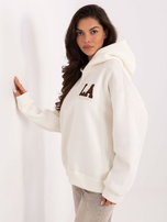 Ecru bluza oversize z napisem na plecach 