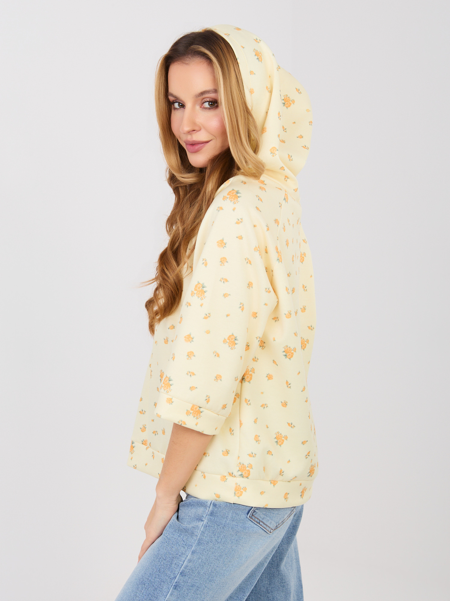 Pastelowa żółta damska bluza oversize z kapturem