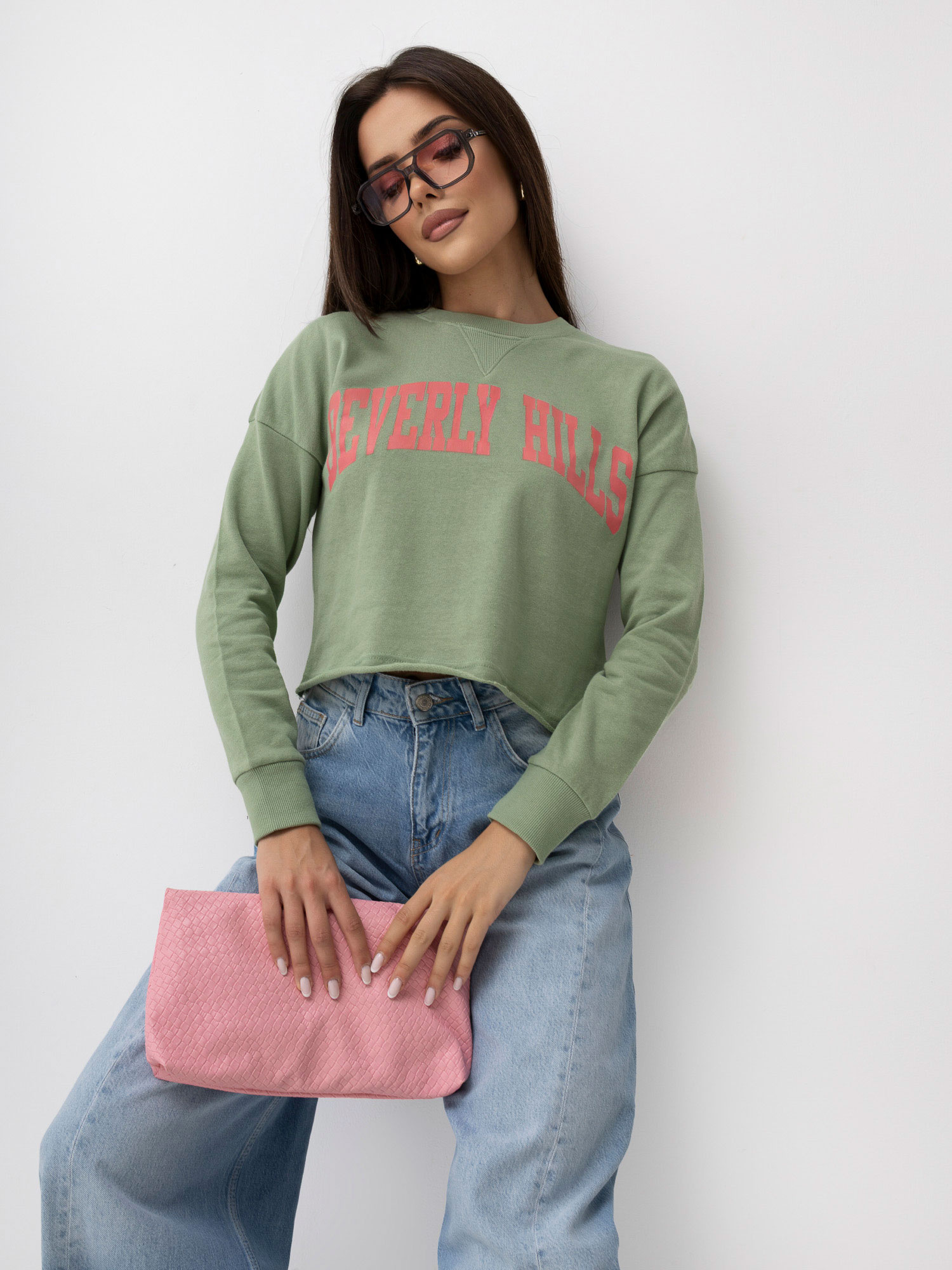 Pistacjowa bluza z kontrastowym napisem SUBLEVEL